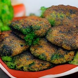 the mushroom patties are transferred to a plate and topped with parsley.
