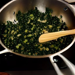 a dish of warm olive oil, onion, garlic, kale, and balsamic vinegar.