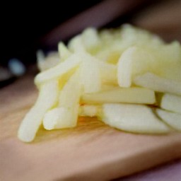 garlic and onions that are peeled and chopped.