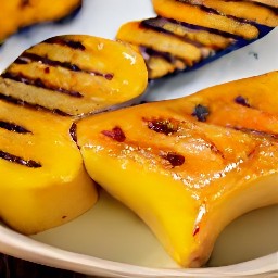 the sugar glazed winter squash is transferred to a serving plate.