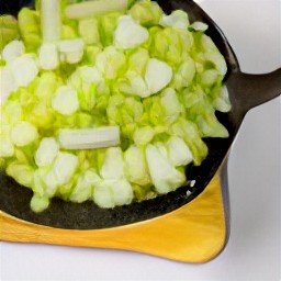 a pan of fried veggies.